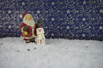 christmas photography picture using marshmallows shaped as snowman with icing for smile and...