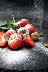 Fresh strawberries with sugar powder delicious dessert.