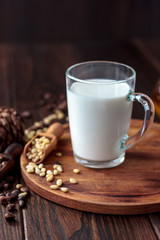 Glass filled by cedar or pine milk with nuts.