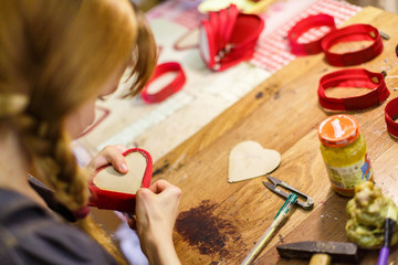 woman manufacturing purses