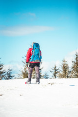 Climber in the winter mountains.