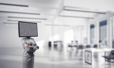 Business woman with TV instead of head.