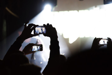 Video recording of the concert on the smartphone phone of the Beach or club party. Ð¡onceptual...