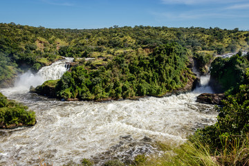 Fototapeta na wymiar Showing both waterfalls of the Murchison Falls, also known as Kabalega Falls, is a waterfall between Lake Kyoga and Lake Albert on the White Nile River in Uganda. 