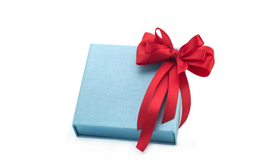 Blue open gift box with red bow isolated on white