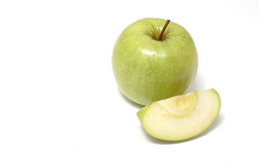 green apple and slice isolated on white