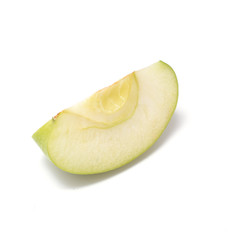 Green apple slice isolated on white background.