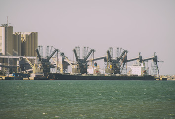 Fototapeta na wymiar Bulk carrier ships near the terminal.