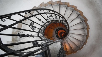 Spiral staircase in an old house. Fibonacci spiral.