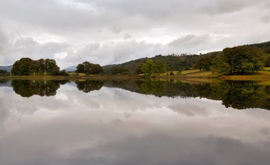 Fototapeta na wymiar Grey Day perfect reflection Esthwaite Lake, Lake District