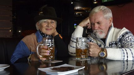 Active cheerful elderly couple