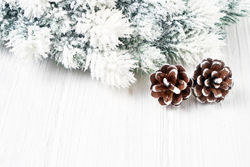 White Christmas background. Christmas fir tree branches with decoration.Copy space