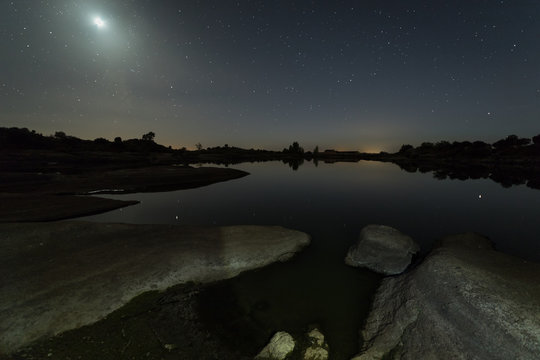 Moonlight. Night photography in the Natural Area of Barruecos. Extremadura. Spain.