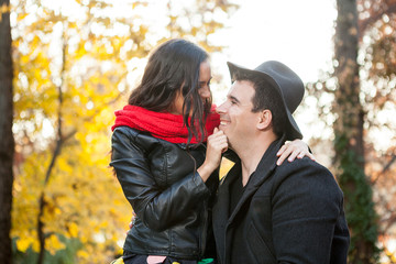 Fototapeta premium Beautiful in love happy couple in autumn park having fun