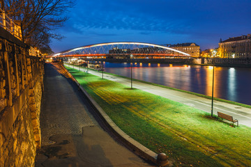 Bernatka footbridge over Vistula river in the night in Krakow, Poland