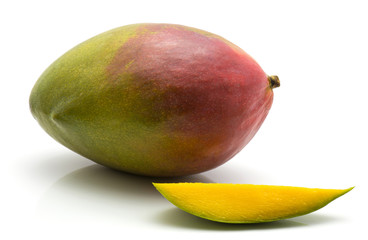 Mango isolated on white background one whole one slice.