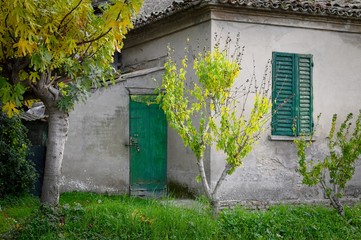 Italian rural house facades and gardens (Pesaro, Italy)
