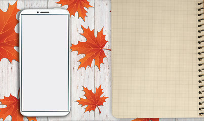 notebook, phone are lying on a wooden table with yellow, autumn leaves - 181540449