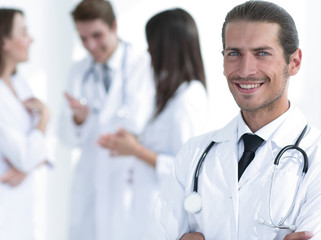 Fototapeta premium smiling doctor therapist on blurred background.