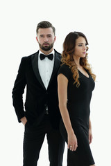 Handsome man and woman in black dress