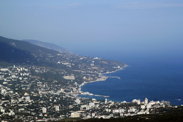 Fototapeta na wymiar View on Yalta and the black sea coast from the mountain AI-Petri