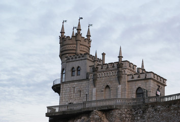 Fototapeta na wymiar Swallow's Nest castle on the rock over the Black Sea in Crimea, This castle is a symbol of Crimea. 