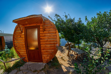 Wooden cottage on the edge of mountain Gorge