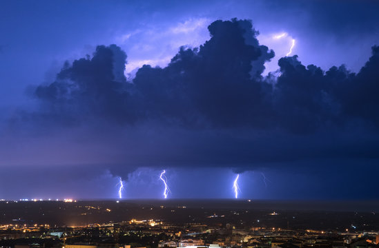 Lightning over the city of Sassari, Sardinia, Italy, Europe