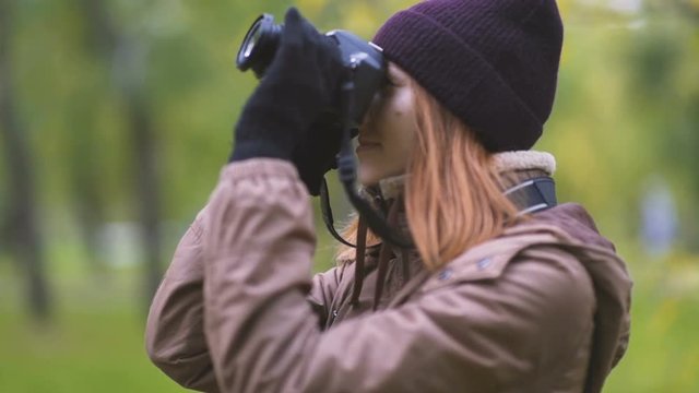 beautiful twoman tourist travel photographer photographing forest at autumn day
