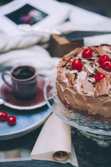 half chocolate cake with cherries