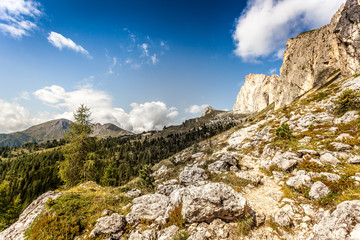 Path at the foots of Mount Settsass, Valparola Pass, Dolomites, Italy
