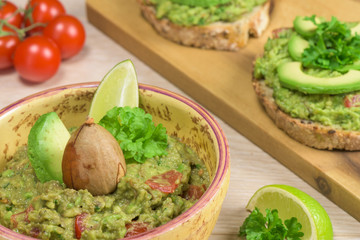 Guacamole - homeamde dish with avocado - traditional Mexican recipe