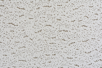 texture of a relief white tile pendant or hem of a ceiling