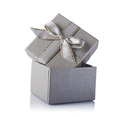 Gray open gift box with satin bow