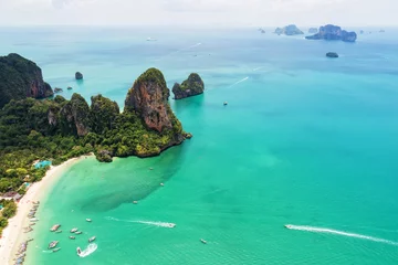 Cercles muraux Railay Beach, Krabi, Thaïlande Aerial view of tropical island, white beach, turquoise lagoon, rocks and islands on horizon, Krabi, Railay, Thailand. Life in paradise. Travelling and holiday concept. People resting on the beach.
