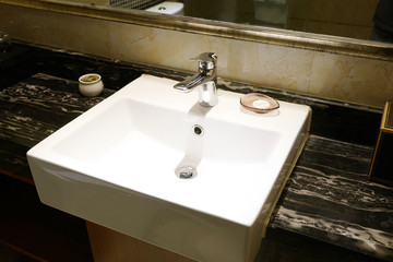 Fototapeta premium water sink and faucet in bathroom