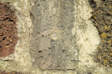 Macro closeup detail of stone surface for abstract grunge stonewall natural textured background