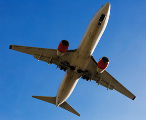 Passenger plane departing in afternoon