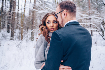 Winter picture of a lovely young couple