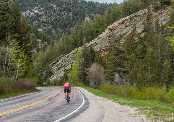Fototapeta na wymiar Bicyclist on Highway