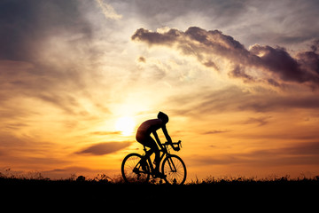 Fototapeta na wymiar Silhouette man cycling