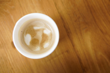 Hot Cappuccino coffee in paper cup