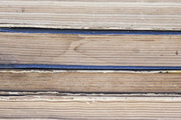 Stack of old books isolated on white background