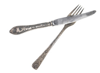Vintage knife and fork on white background