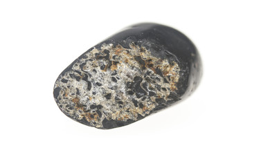 Heap of spa hot stones isolated on white