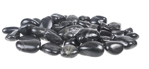 Heap of spa hot stones isolated on white