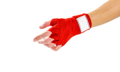 Hand in red Boxing bandages. Sports armband. Isolated on white background