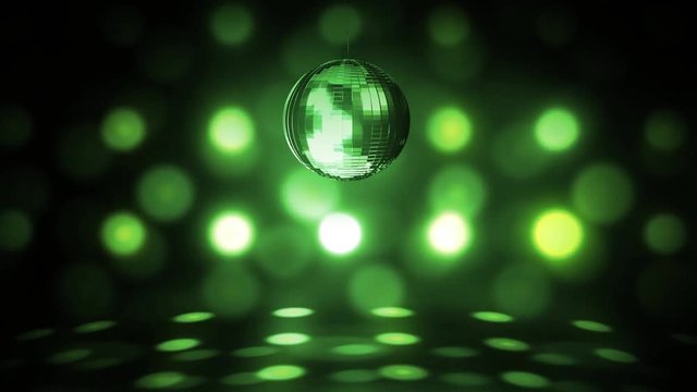 Green glowing spinning disco ball groovy background