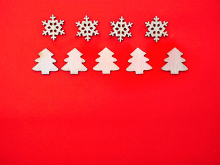 wooden snowflakes and pine trees