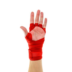 Hand in red Boxing bandages. Sports armband. Isolated on white background